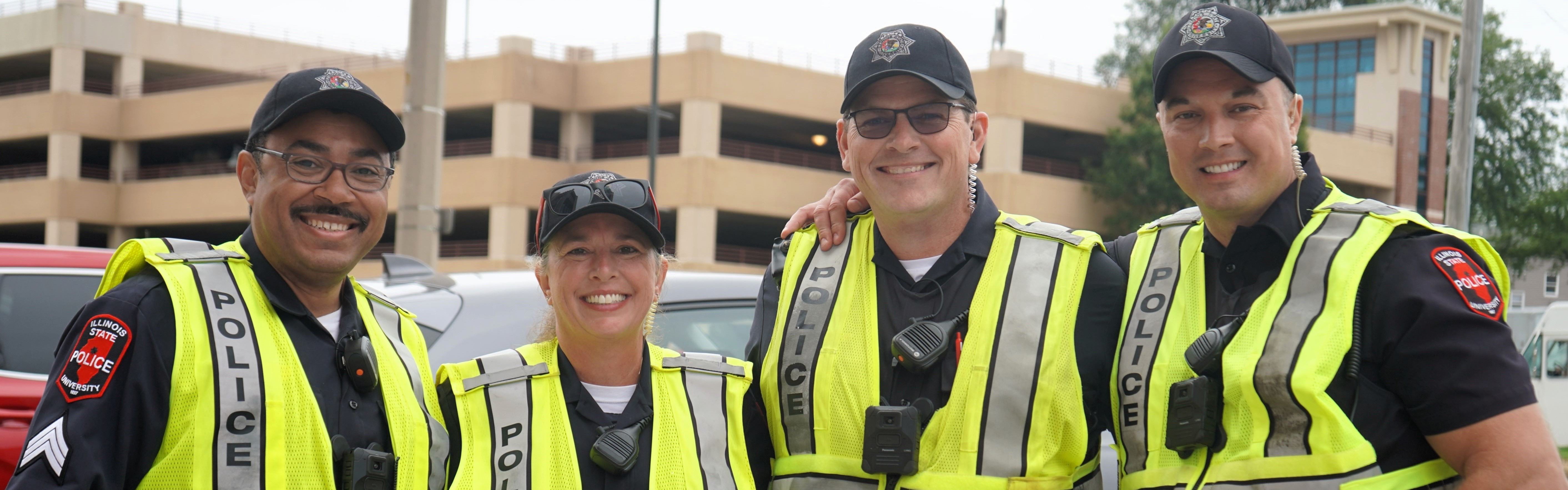 A group of police officers pose together during Move-In.